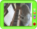 A girl playing 'I had a little nut tree on piano